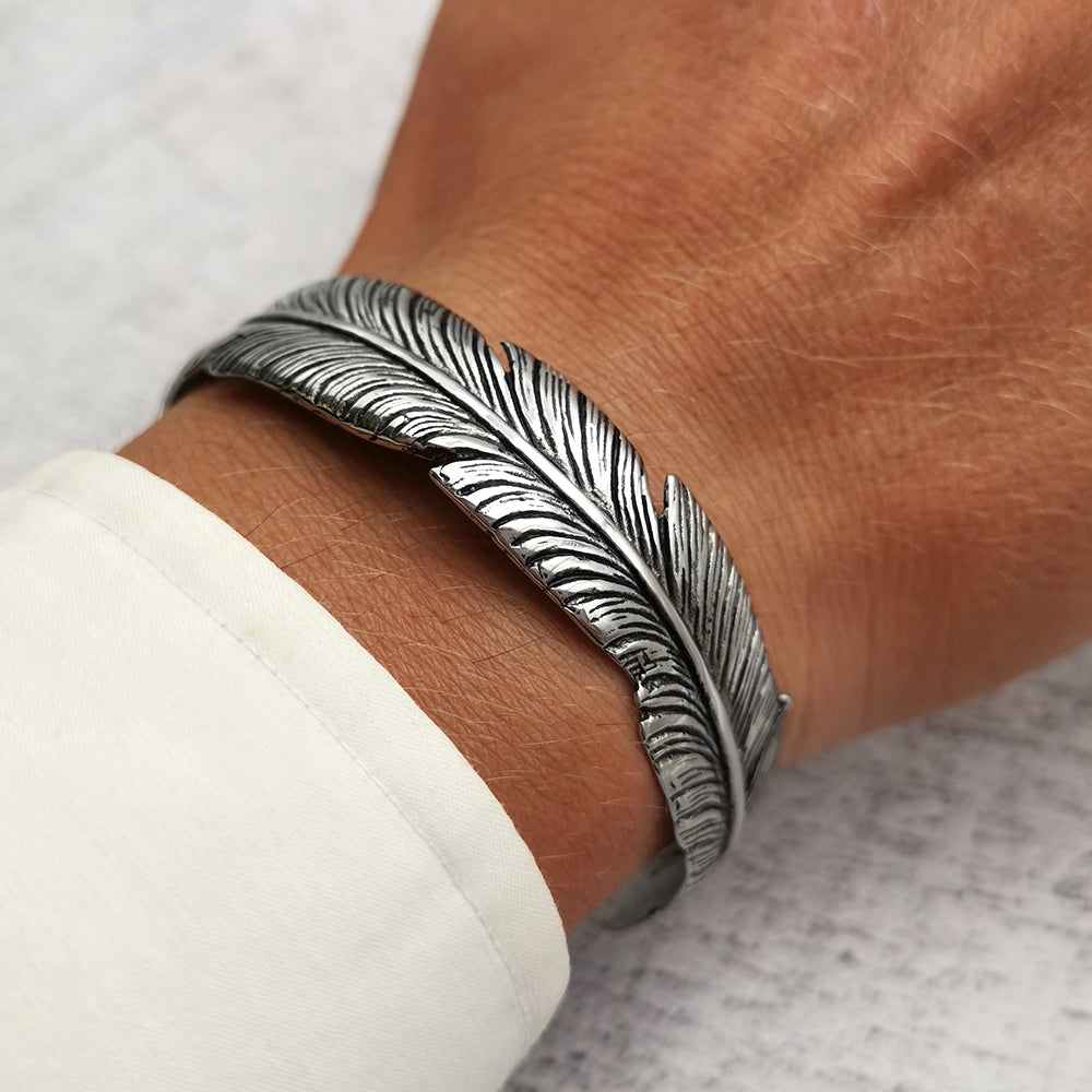 Bracciale da uomo in acciaio piuma rigido colore argento lucido a fascia regolabile